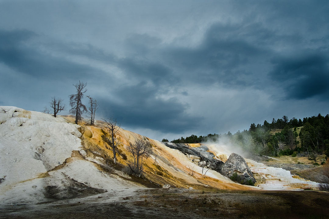 Landscape photograph of geyser at Yellowstone National Park in Wyoming